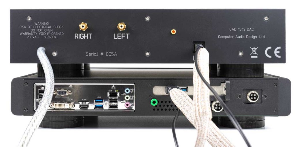 CAD Server-Streamer-Sourceplayer und Wandler CAD 1543 DAC MKII und CAT (CAD Audio Transport) - Der puristische USB-Wandler (oben) kommt mit USB-Schnittstelle und zwei analogen Cinch-Ausgängen aus, der Musikcomputer CAT (unten) hat ein typisches PC-Anschlussfeld (links) und zwei spezielle USB-3.0-Ports für Audiogeräte (rechts).